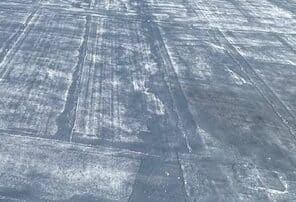 Roofing contractor working on flat roof in New York roofing contractor working on flat roof ny