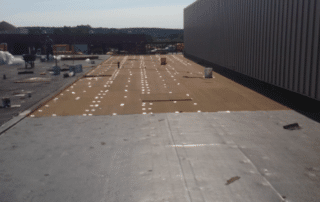 Roofing crew installing tpo roof in New York roofing crew installing tpo roof ny